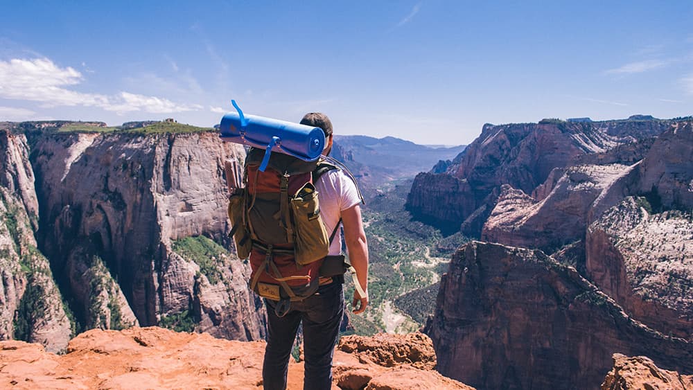 backpaker overlooking Zion